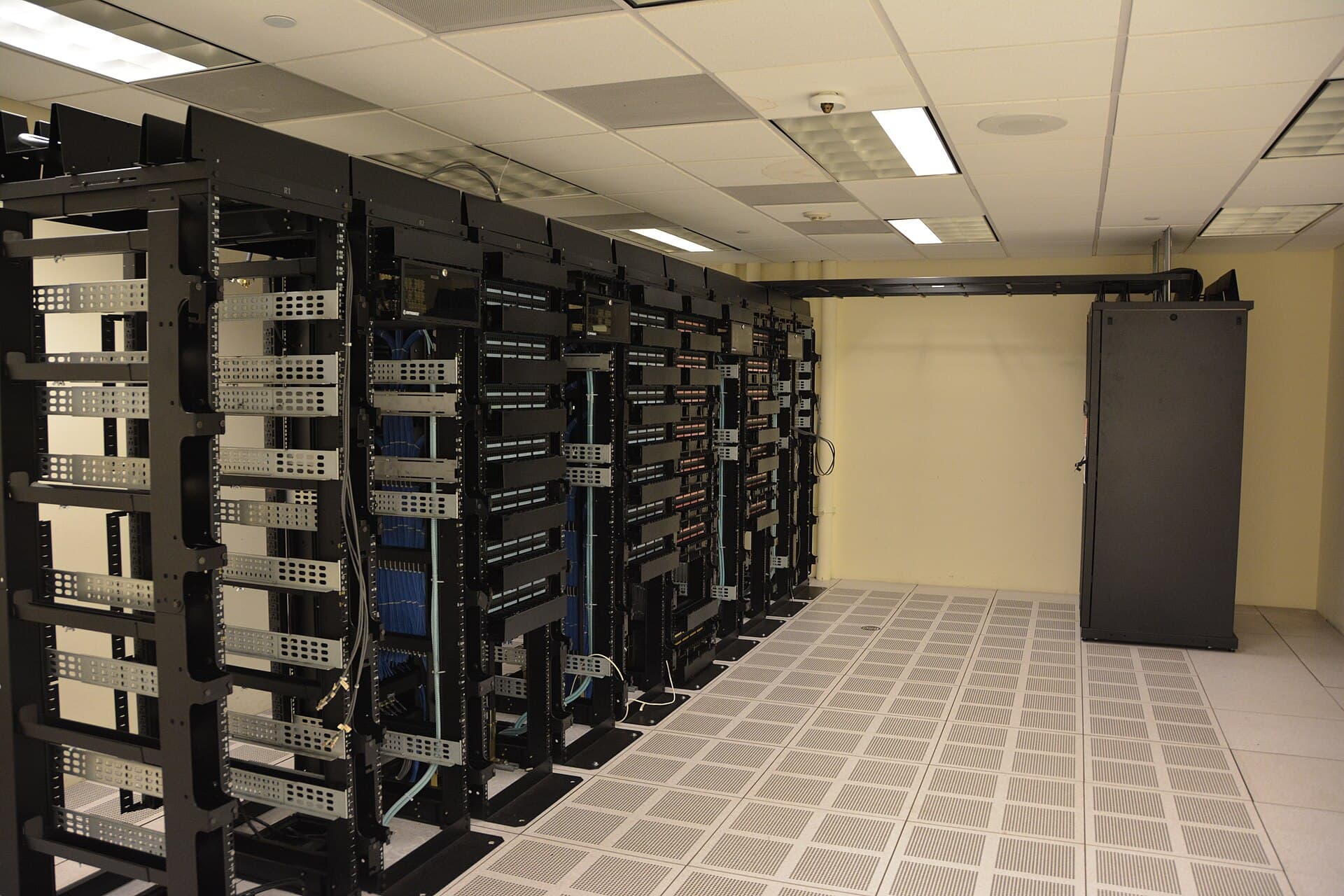 Rows of datacenter server racks.